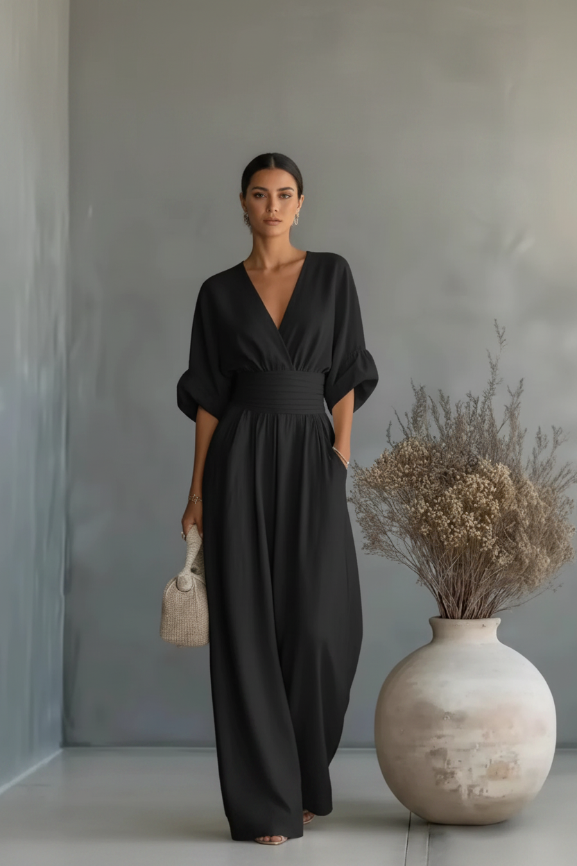 RISEL - Elegante tuta con scollo a V profondo