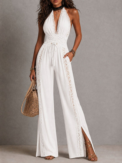 Romina | Tuta nera halter con pannelli in pizzo e vita arricciata