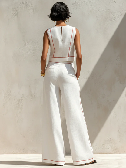 Completo pantalone in misto lino con cuciture a contrasto