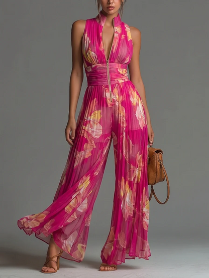 Tuta Serafina | Chiffon plissettato fucsia con stampa floreale
