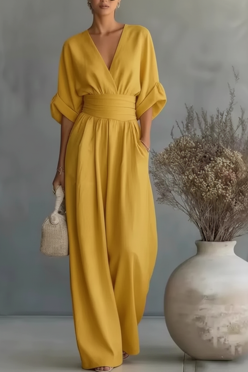 RISEL - Elegante tuta con scollo a V profondo