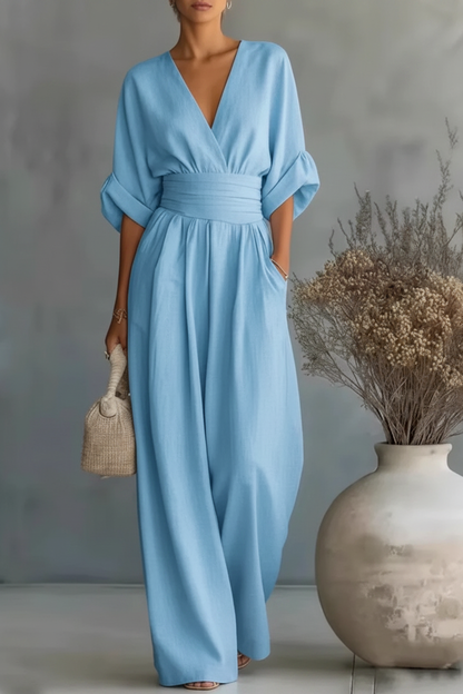 RISEL - Elegante tuta con scollo a V profondo