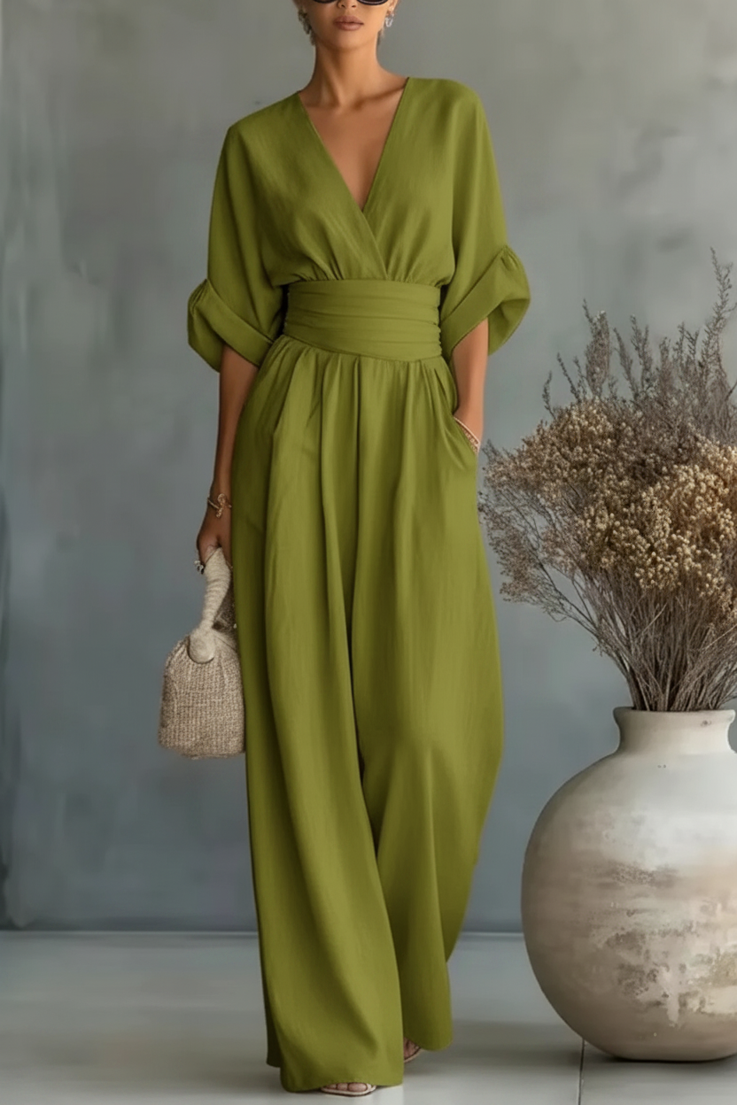 RISEL - Elegante tuta con scollo a V profondo