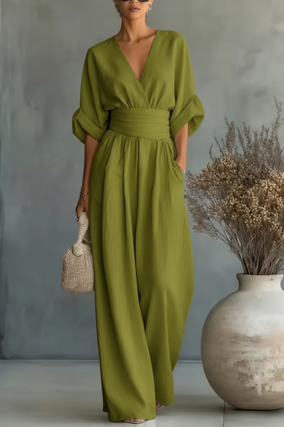 RISEL - Elegante tuta con scollo a V profondo